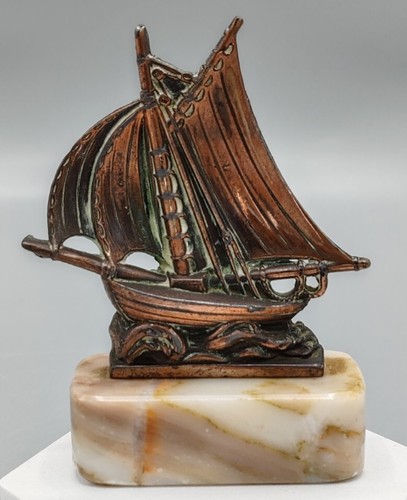 Sculpture laiton d un - en,