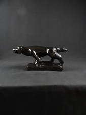 Chien en céramique noire de