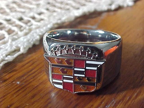 1950s cadillac crest silver - cadillac,