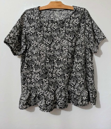 Blouse noir fleurs - à,