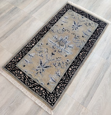 Tapis en laine noué à la