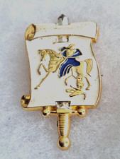 Un insigne militaire " Ecole