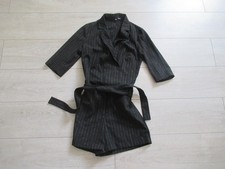 Combinaison short noire à rayures argentées taille 34 ETAM