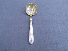 cuillère à saupoudrer manche