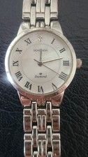 Montre Quartz Femme Sekonda.  Swatch 