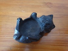 Porte bougie en fonte sculpté