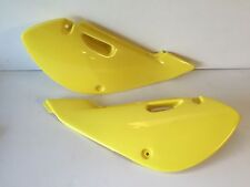 UNE PAIRE DE CACHE CARENAGE COQUE ARRIERE LATERAUX JAUNE SUZUKI 65 RM 2003 2004