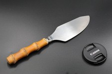 Pelle à tarte manche en