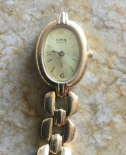 Clyda Paris montre femme plaqué or 18 k  pile à changer 1 mailon manquant tbe