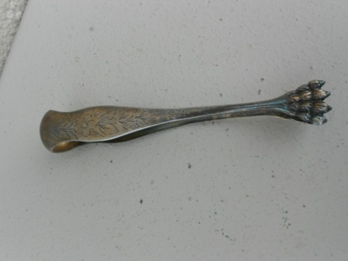 Pince sucre métal - à,