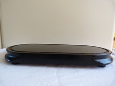 Socle en bois noirci pour