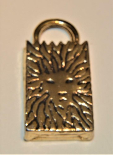 Pendentif forme tête de - en,