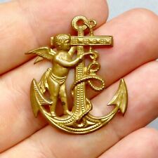 Anchor and Cherub. Antique Large Pendant. In thin sheet brass. Sew on badge.