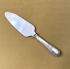 pelle à tarte coupante