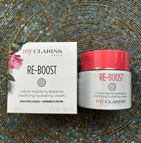 Crème boost clarins neuve - re,