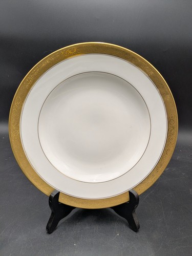 Belle assiette creuse doré
