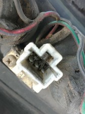 feu avant gauche pour NISSAN