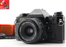 Appareil photo argentique noir Canon AE-1 Program nouvel objectif FD 28mm...