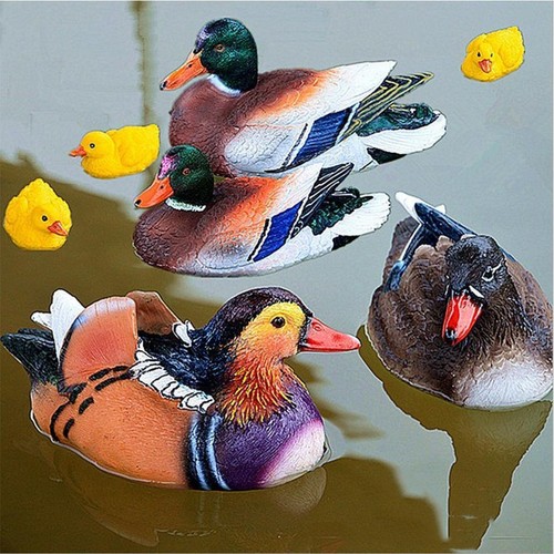 Une paire statues canard - paire,