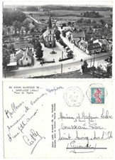 CPSM 1961 Place de l’Eglise En avion au-dessus de SAINT LOUP 03 Allier (réf 483)