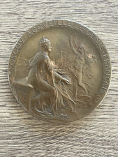 ancienne médaille en bronze