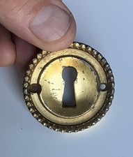 entree de serrure ancienne ronde en bronze laiton massif style louis XVI