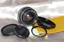 Objectif 35mm f2,8 CARL ZEISS DISTAGON, bouchons, filtre, pare-soleil et housse