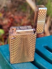 ANCIEN BRIQUET MÉTAL DORÉ