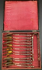 12 cuilleres pince a sucre