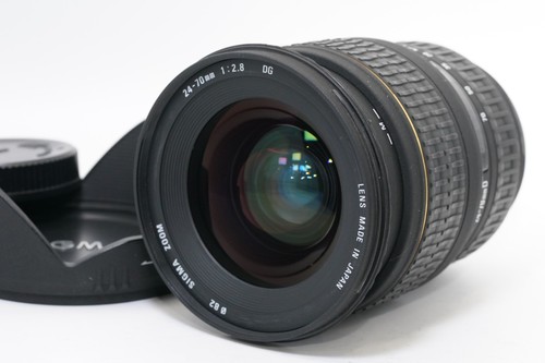 Près sigma objectif zoom - de],