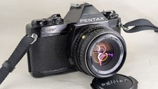 Reflex argentique Pentax MV noir avec objectif Pentax 1.8/50mm & flash National