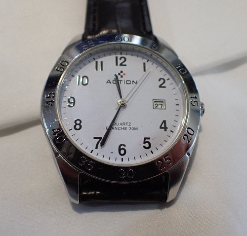 Montre mixte action - montre, a
