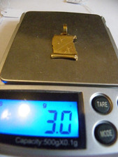 pendentif or jaune 18 carats genre parchemin