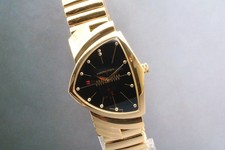 Comme neuf montre à - [n, neuf]