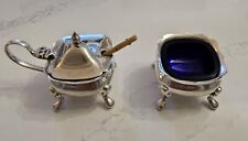 Ancienne saliere et poivriere verre  et métal argenté. 