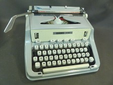 Ancienne machine à écrire JAPY P90 avec sa valisette old typewritter