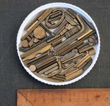 Lot de fers à dorer plaque