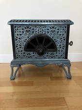 Ancien poêle PIED SELLE Modèle 405 Noël Fonte émaillée 