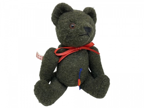 Artiste ours peluche - en,