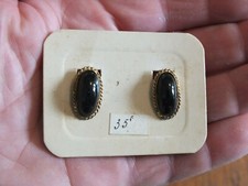 Paire de boucles d'oreille à clips vintage neuves de Stock - médaillons noirs