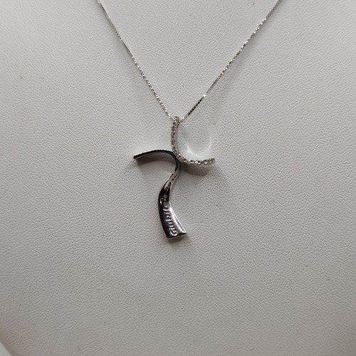 Croix diamants stylisée et - en,