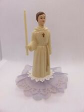 323 - Figurine avec cierge -