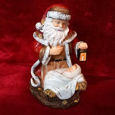 Décoration statuette en résine Père Noël Santa Claus et divin Enfant Jésus 20cm