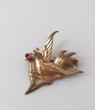 Broche doré hirondelle vintage 1950