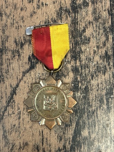 Ancienne médaille patinage