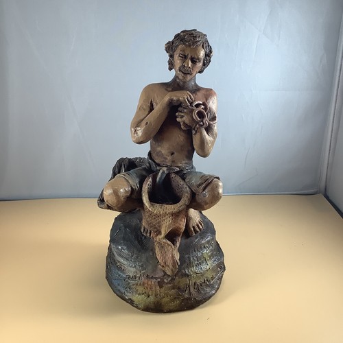 Belle terre cuite - cuite, pêcheur
