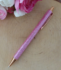 Stylo bille rose à paillettes