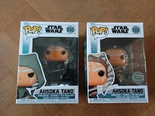 2 figurines à tête