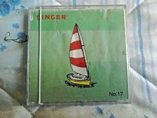 Carte à broder Singer