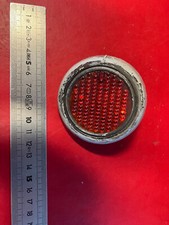 Ancien catadioptre rond rouge vintage moto ancienne